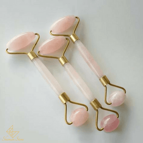 Rouleau de massage en quartz rose pour le visage